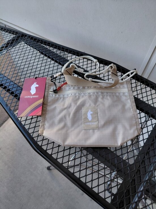 cotopaxi Handbags - Cotopaxi Lightweight Crossbody Bag Cream Everyday Hiking Travel Bag NWT